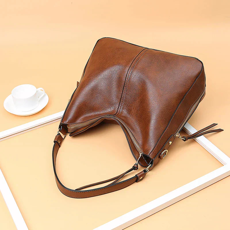 Romy | Sac à bandoulière en cuir